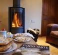 Enjoy a slice or two of Lincolnshire Plum Loaf beside the wood burner.