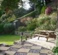 The garden and patio which have fantastic views accross the valley
