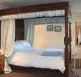 RElax andsleep well in a kingsize four poster bed