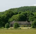 The cottages sit below Dunmore Woods