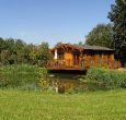 Lodge with luxurious four poster and 4 person hot tub for a romantic break
